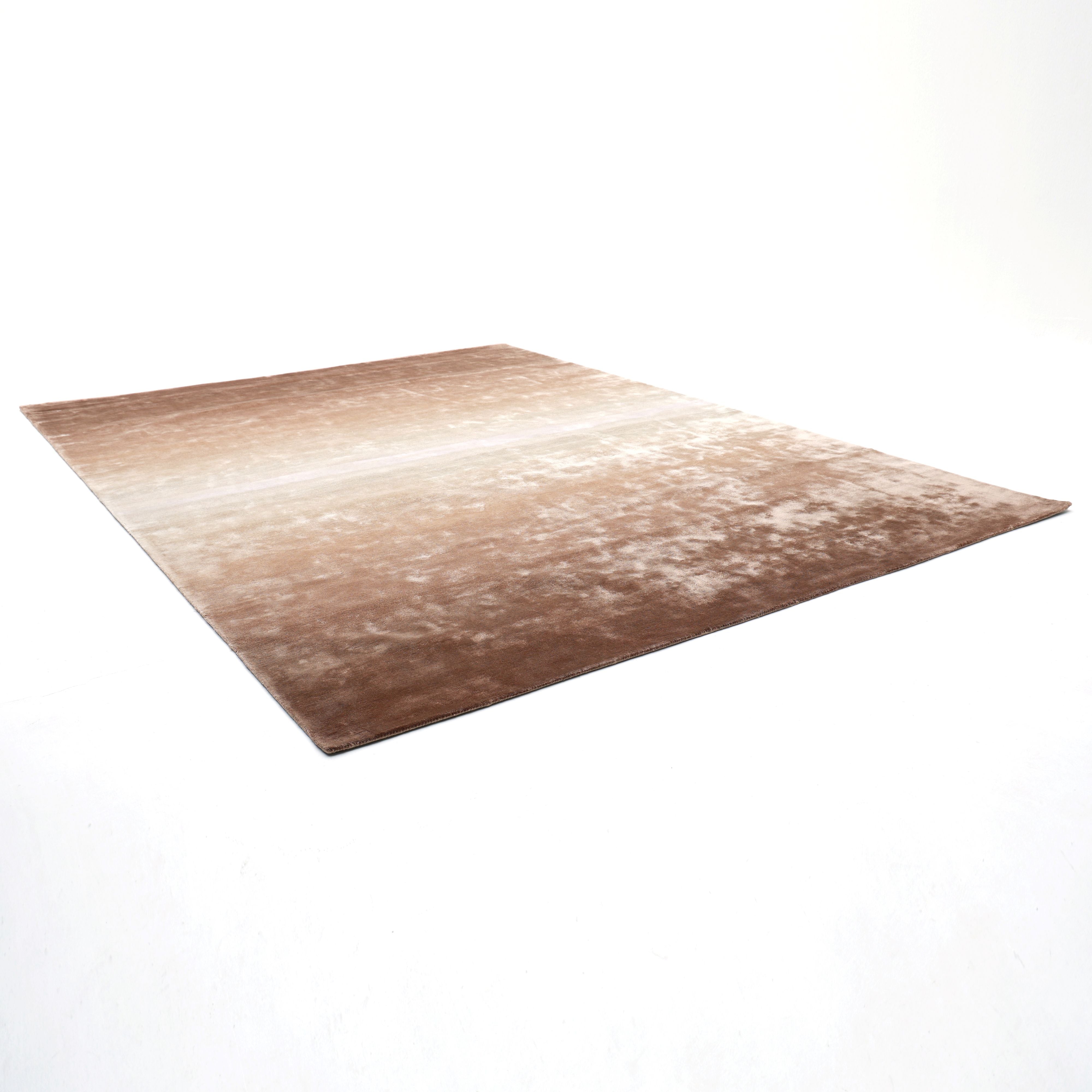 The RAMSHA HOME Caramel Ombre Handmade Area Rug - HTV 26 (300x400 cm) features a rectangular brown design with a subtle gradient and neutral border, shown on a white background and photographed from a low angle.