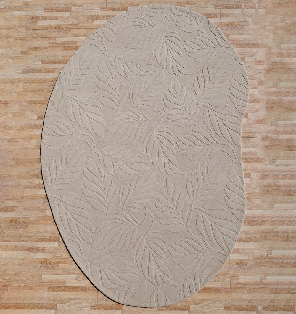 The RAMSHA HOME Premium Off-White Area Carpet - HTW 115 (200x300 cm), hand-tufted with a raised leaf pattern, enhances the look of a light brown wooden floor.