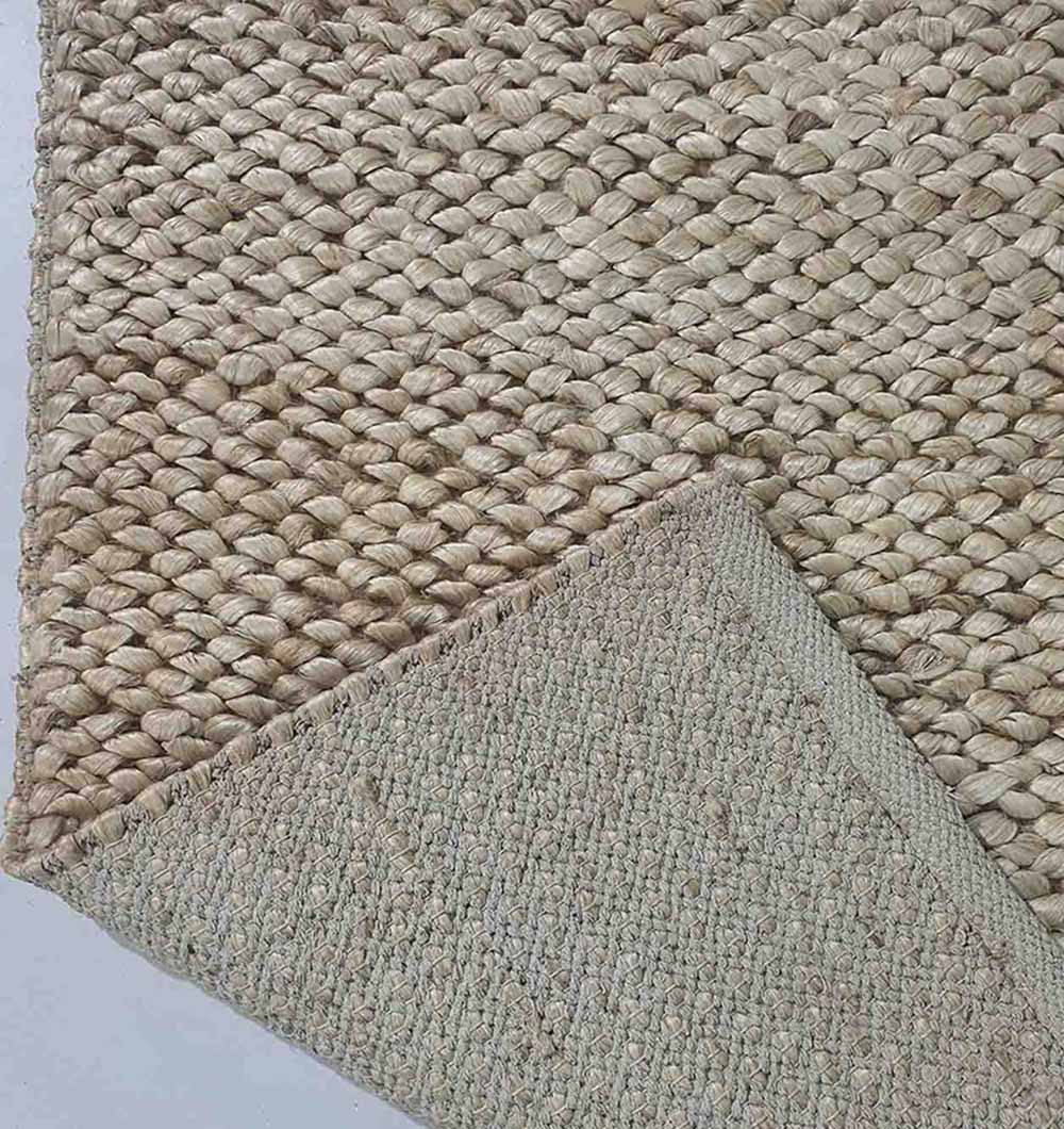 Close-up of the RAMSHA HOME Bleach Color Woven Floor Rug For Home Decor SR-037, featuring a stylish beige rectangle with thick braids; a flipped corner displays the backing and underside.